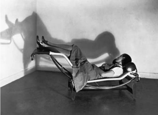 Charlote-Perriand-lying-on-lounge-chair